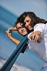 Image showing happy young couple have fun at beautiful beach