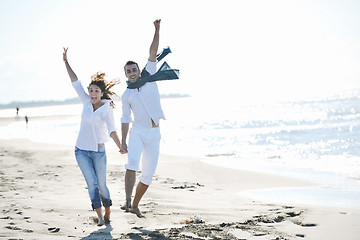 Image showing happy young couple have fun at beautiful beach