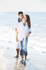 Image showing happy young couple have fun at beautiful beach