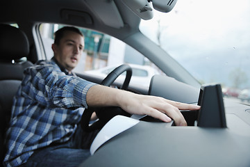 Image showing man using car navigation