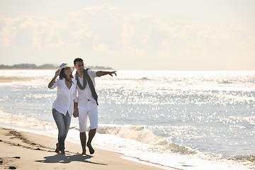 Image showing happy young couple have fun at beautiful beach