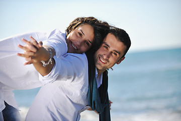 Image showing happy young couple have fun at beautiful beach