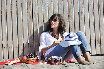 Image showing happy young woman on beach