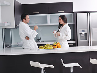 Image showing young couple have fun in modern kitchen