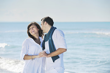 Image showing happy young couple have fun at beautiful beach