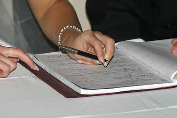 Image showing signing the register