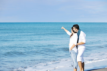 Image showing happy young couple have fun at beautiful beach