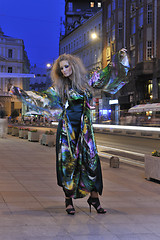 Image showing elegant woman on city street at night