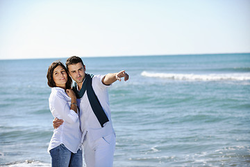 Image showing happy young couple have fun at beautiful beach