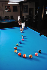 Image showing young man play pro billiard game 