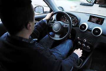 Image showing man using car navigation