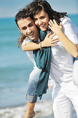 Image showing happy young couple have fun at beautiful beach