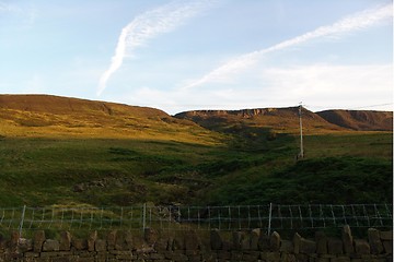 Image showing sun on the hillside