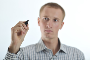 Image showing handsome young business man touching screen isolated