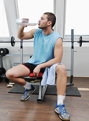 Image showing man drink water at fitness workout