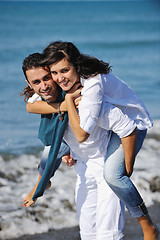 Image showing happy young couple have fun at beautiful beach