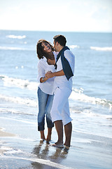 Image showing happy young couple have fun at beautiful beach