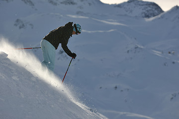 Image showing woman skiing on fresh snow at winter season 