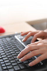 Image showing woman hands typing on laptop keyboard