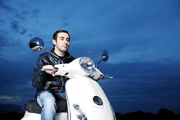 Image showing young man ride retro scooter