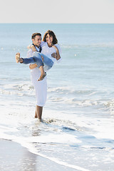 Image showing happy young couple have fun at beautiful beach