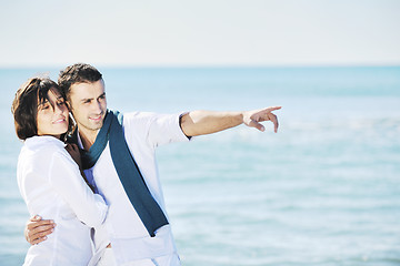 Image showing happy young couple have fun at beautiful beach