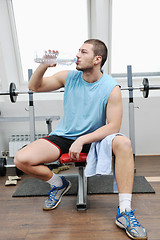 Image showing man drink water at fitness workout