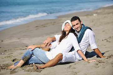 Image showing happy young couple have fun at beautiful beach