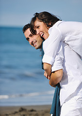 Image showing happy young couple have fun at beautiful beach