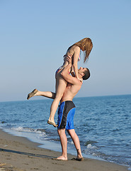 Image showing happy young couple have romantic time on beach