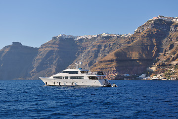 Image showing santorini island coast with luxury yacht