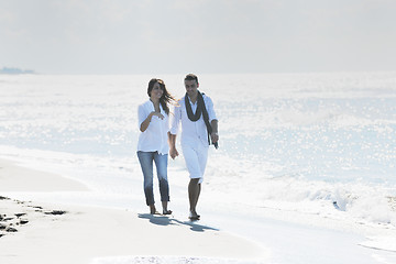 Image showing happy young couple have fun at beautiful beach