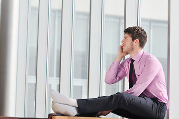 Image showing young business man talk by cellphone