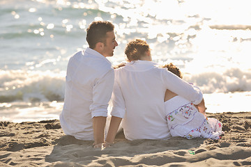 Image showing happy young  family have fun on beach