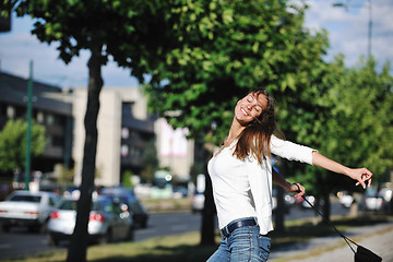 Image showing young woman havefun at street 