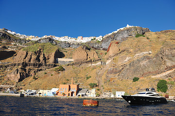 Image showing santorini island coast with luxury yacht