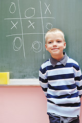 Image showing happy young boy at first grade math classes 