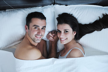 Image showing young couple have good time in their bedroom