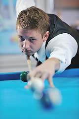 Image showing young man play pro billiard game 