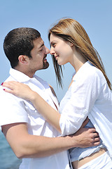 Image showing happy young couple have fun on beach