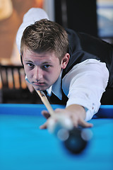 Image showing young man play pro billiard game 