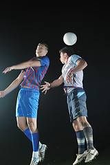 Image showing football players in competition for the ball