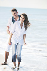 Image showing happy young couple have fun at beautiful beach