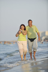 Image showing happy seniors couple  on beach