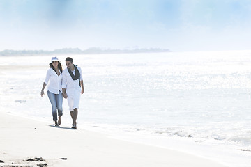 Image showing happy young couple have fun at beautiful beach