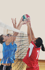 Image showing girls playing volleyball indoor game