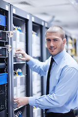 Image showing young it engineer in datacenter server room