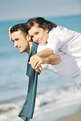 Image showing happy young couple have fun at beautiful beach