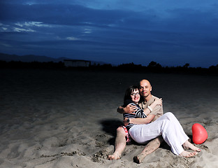 Image showing happy young couple have fun on beach