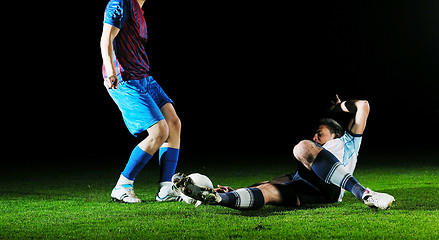 Image showing football players in competition for the ball